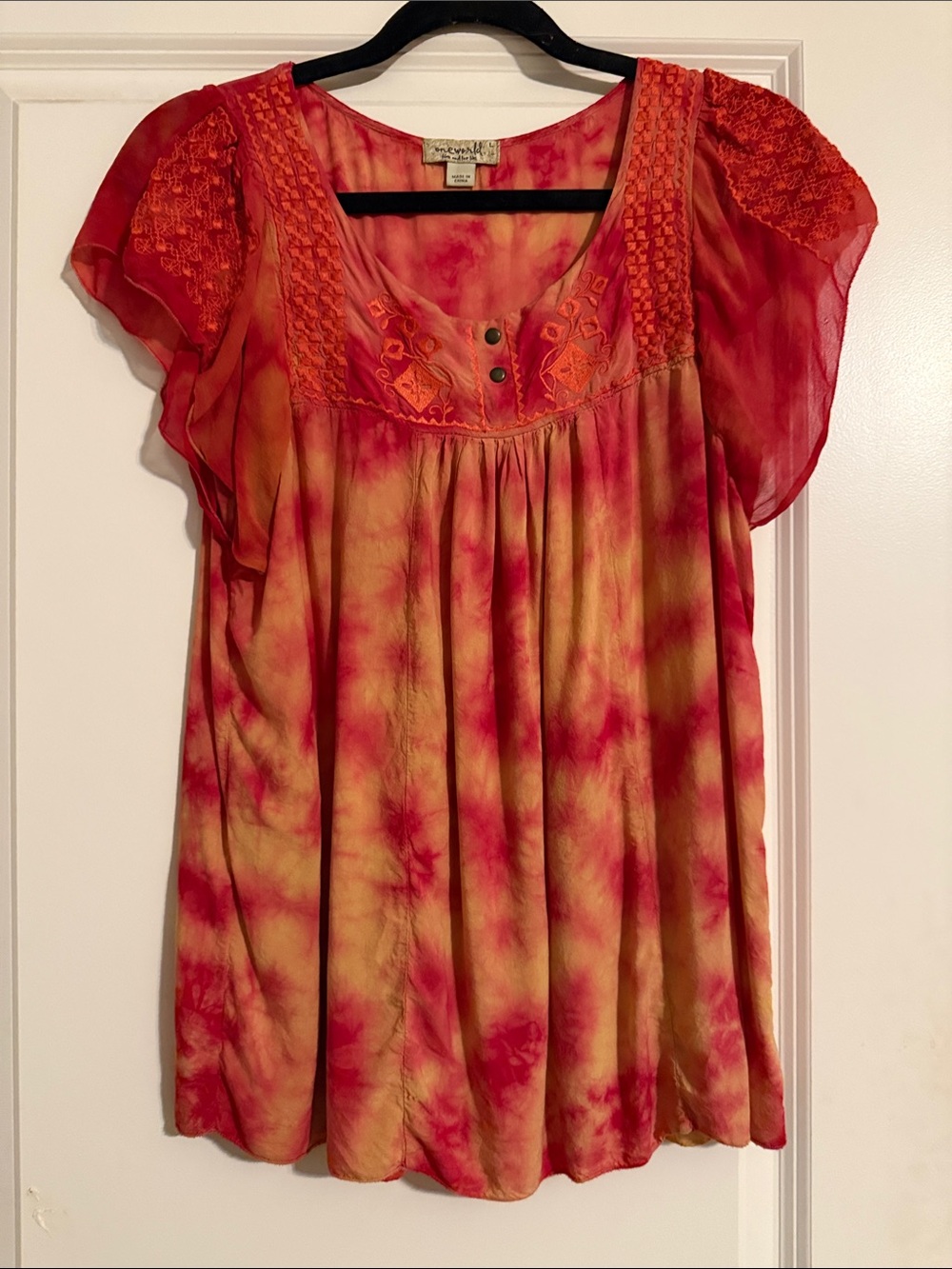 One World Brand Red and Orange Tie-Dye Flutter Sleeve Top.